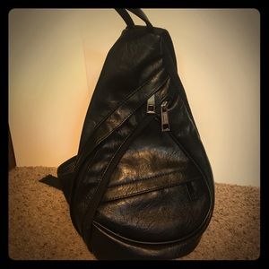 Leather sling backpack